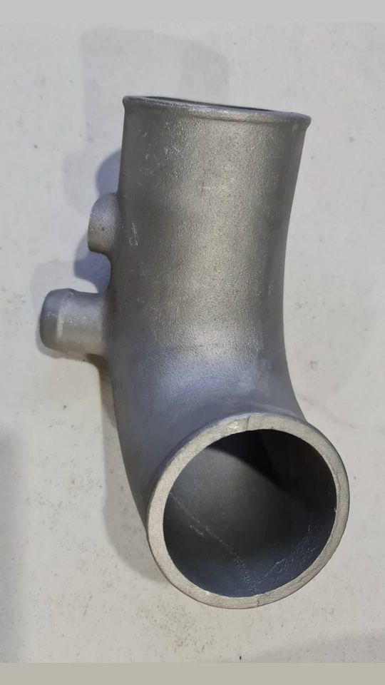 Ford FG Cast alloy throttle pipe.